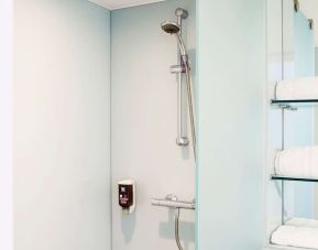 Guest bathroom with shower at Ibis Styles Crewe.