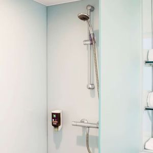 Guest bathroom with shower at Ibis Styles Crewe.