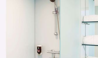 Guest bathroom with shower at Ibis Styles Crewe.