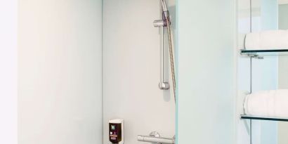 Guest bathroom with shower at Ibis Styles Crewe.