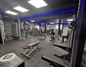 Fully equipped fitness center at Best Western Plus Dover Marina Hotel & Spa.