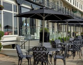 Outdoor seating facing the lake at Best Western Plus Dover Marina Hotel & Spa.