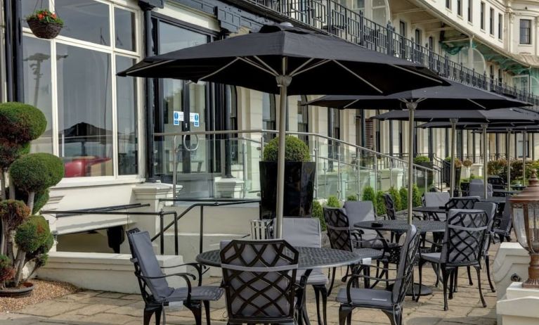 Outdoor seating facing the lake at Best Western Plus Dover Marina Hotel & Spa.