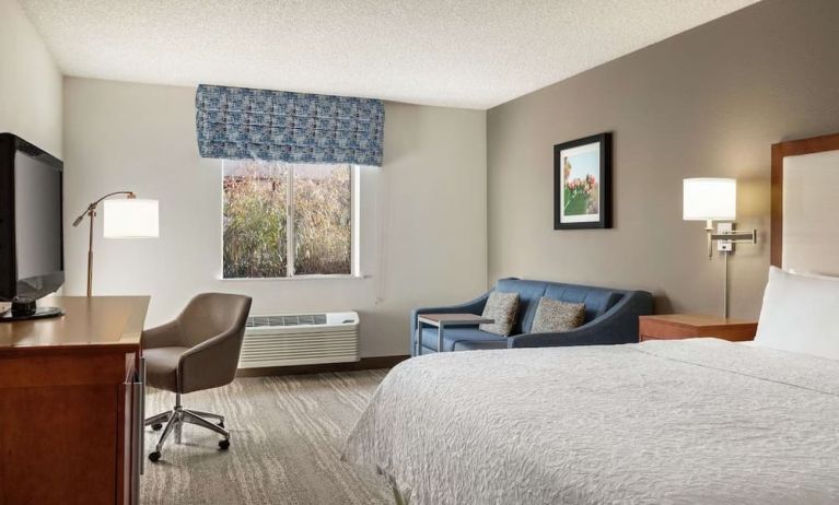 Day use room with work desk and sofa at Hampton Inn Phoenix-Midtown-Downtown Area.