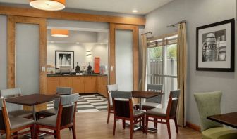 Dining area perfect for coworking at Hampton Inn Phoenix-Midtown-Downtown Area.