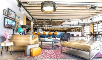 Lobby and coworking lounge at Moxy Phoenix Tempe/ASU Area.