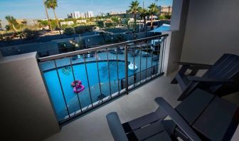 Balcony inside day use room with a view of the pool at Moxy Phoenix Tempe/ASU Area.