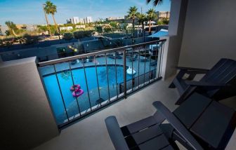 Balcony inside day use room with a view of the pool at Moxy Phoenix Tempe/ASU Area.