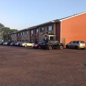 Parking area at Coratel Inn & Suites By Jasper New Richmond.