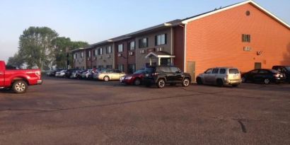 Parking area at Coratel Inn & Suites By Jasper New Richmond.