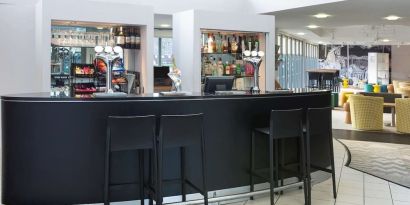 Hotel bar and lounge area at Ibis Styles Haydock.