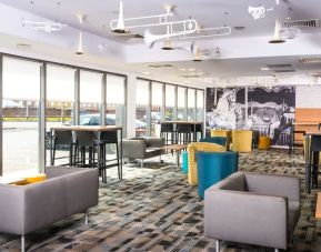 Lobby lounge area at Ibis Styles Haydock.