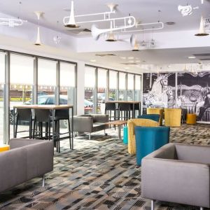 Lobby lounge area at Ibis Styles Haydock.