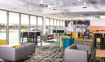 Lobby lounge area at Ibis Styles Haydock.