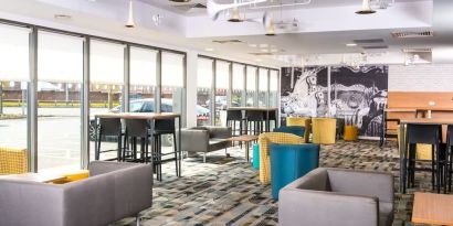 Lobby lounge area at Ibis Styles Haydock.