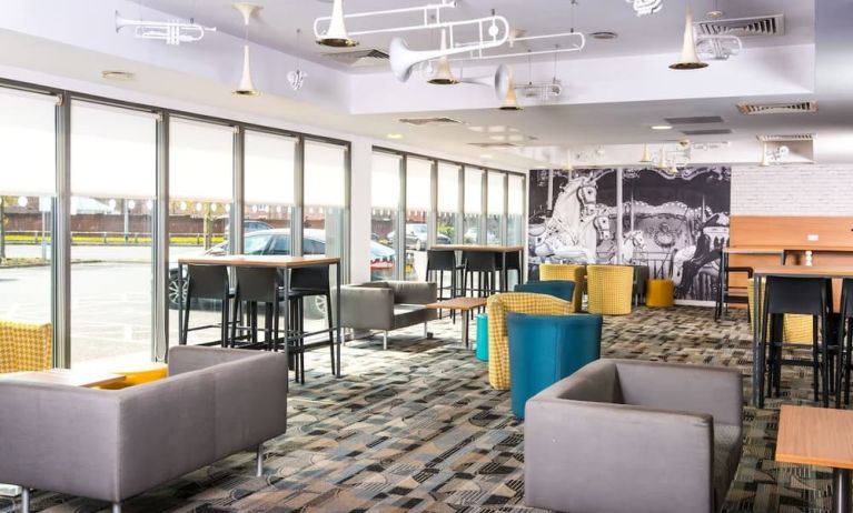 Lobby lounge area at Ibis Styles Haydock.