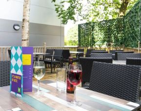 Terrace patio with lounge seating at Ibis Styles Haydock.