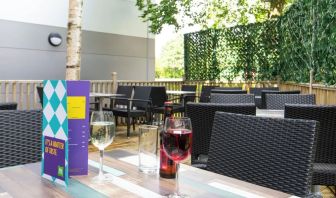 Terrace patio with lounge seating at Ibis Styles Haydock.