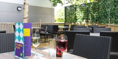 Terrace patio with lounge seating at Ibis Styles Haydock.