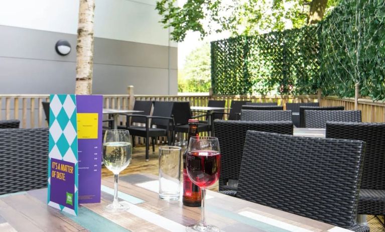 Terrace patio with lounge seating at Ibis Styles Haydock.