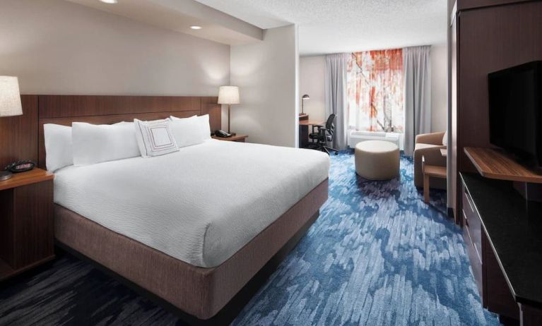 Day use room with work desk and sofa at Fairfield Inn By Marriott Denver Airport.