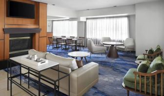 Lobby and coworking lounge at Fairfield Inn By Marriott Denver Airport.