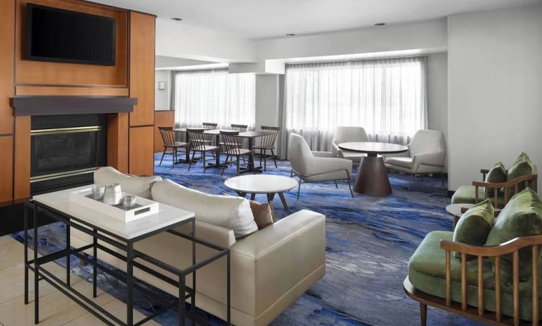 Lobby and coworking lounge at Fairfield Inn By Marriott Denver Airport.