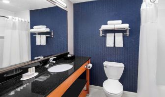 Guest bathroom with shower at Fairfield Inn By Marriott Denver Airport.