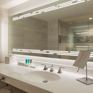 Guest bathroom with shower at Hyatt Regency Dallas.