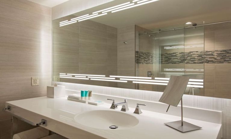 Guest bathroom with shower at Hyatt Regency Dallas.