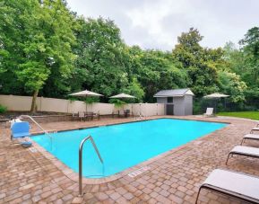 Refreshing outdoor pool at Courtyard By Marriott Charlotte Airport/Billy Graham Parkway.