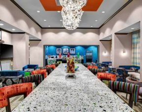 Dining area perfect for coworking at Hampton Inn & Suites Atlanta Perimeter Dunwoody.