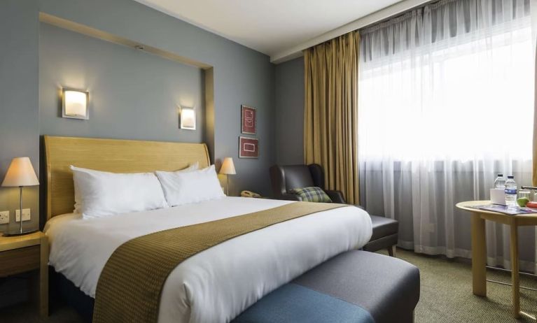 Day use room with workspace and lounge seating at Best Western London Heathrow Ariel Hotel.