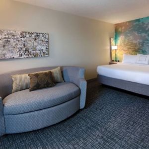 Day use room with sofa at Courtyard By Marriott Dallas DFW Airport North/Irving.