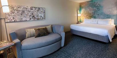 Day use room with sofa at Courtyard By Marriott Dallas DFW Airport North/Irving.