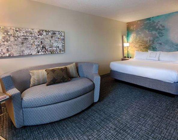 Day use room with sofa at Courtyard By Marriott Dallas DFW Airport North/Irving.