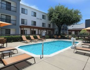 Refreshing outdoor pool at Courtyard By Marriott Dallas DFW Airport North/Irving.