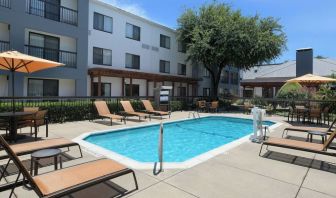 Refreshing outdoor pool at Courtyard By Marriott Dallas DFW Airport North/Irving.