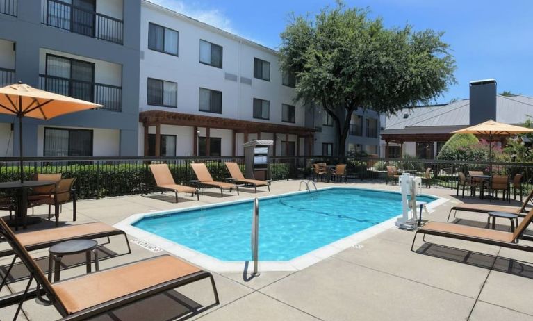 Refreshing outdoor pool at Courtyard By Marriott Dallas DFW Airport North/Irving.