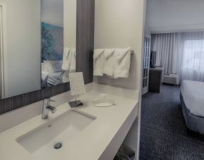 Guest bathroom inside day use room at Courtyard By Marriott Dallas DFW Airport North/Irving.