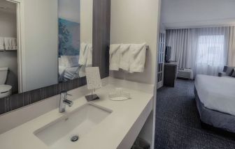 Guest bathroom inside day use room at Courtyard By Marriott Dallas DFW Airport North/Irving.