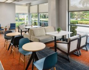 Dining area perfect for coworking at Hyatt HOUSE Fort Lauderdale Airport-South & Cruise Port.