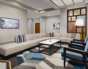 Lobby and coworking lounge at Hyatt HOUSE Fort Lauderdale Airport-South & Cruise Port.