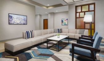 Lobby and coworking lounge at Hyatt HOUSE Fort Lauderdale Airport-South & Cruise Port.