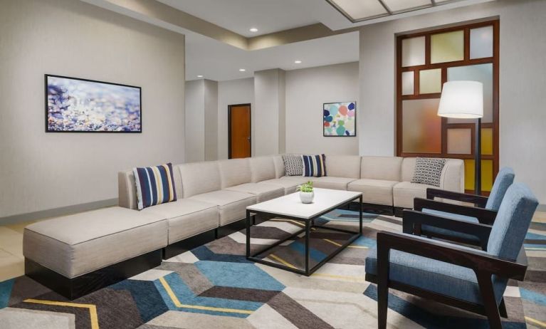 Lobby and coworking lounge at Hyatt HOUSE Fort Lauderdale Airport-South & Cruise Port.