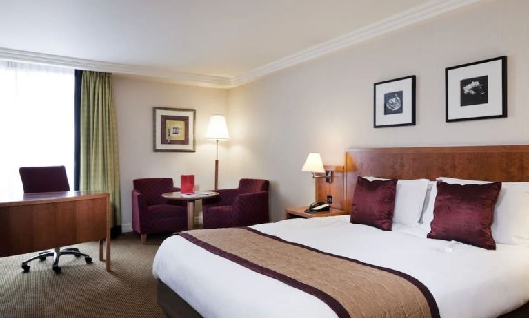 Standard day use room with work desk, lounge seating and private bathroom at Crowne Plaza London - Heathrow.