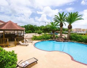 Refreshing outdoor pool at Best Western Pearland Inn.