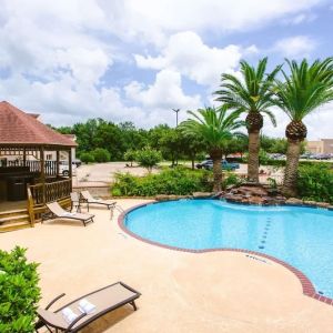 Refreshing outdoor pool at Best Western Pearland Inn.