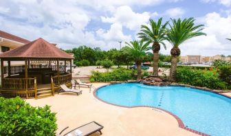 Refreshing outdoor pool at Best Western Pearland Inn.