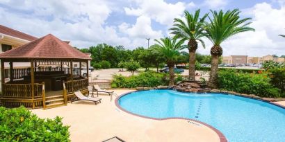 Refreshing outdoor pool at Best Western Pearland Inn.